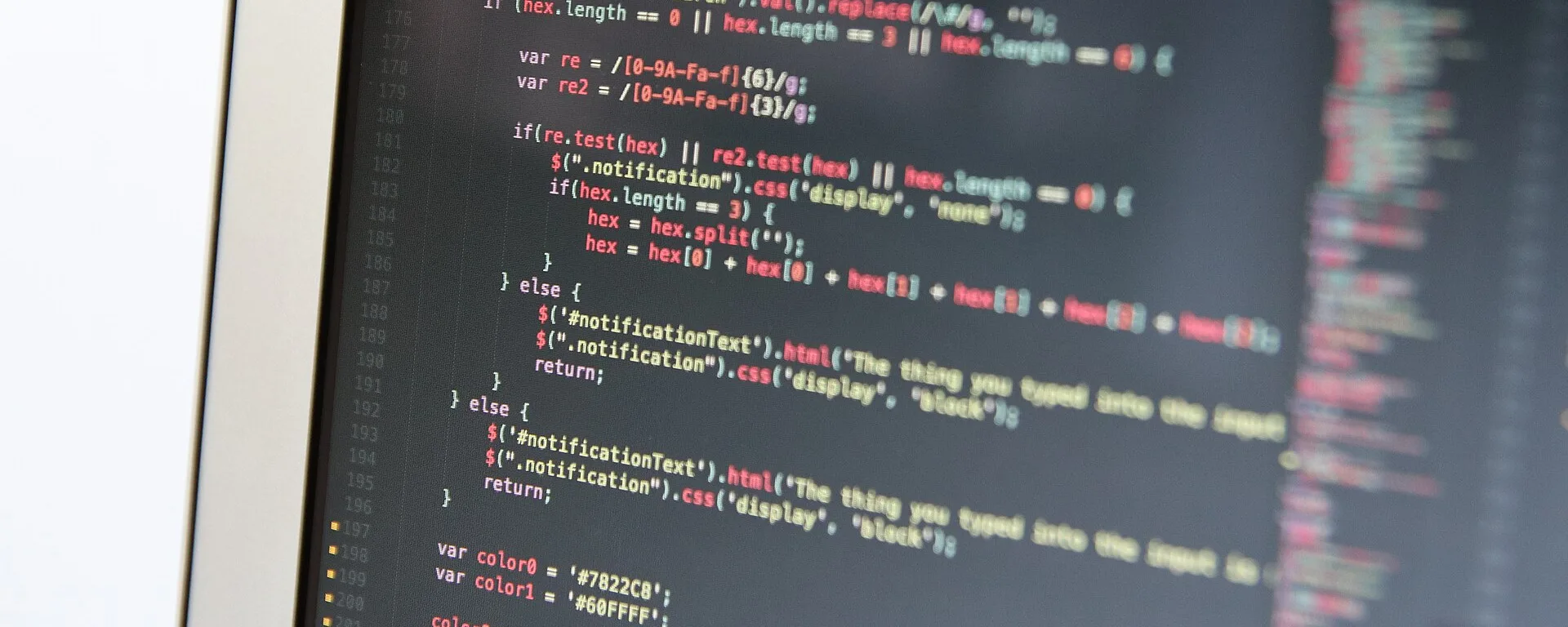 Close-up of colorful code on a laptop screen